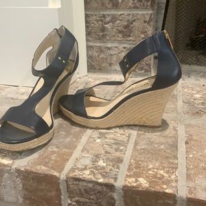 Navy blue Michael Kors wedges. Only worn one time.